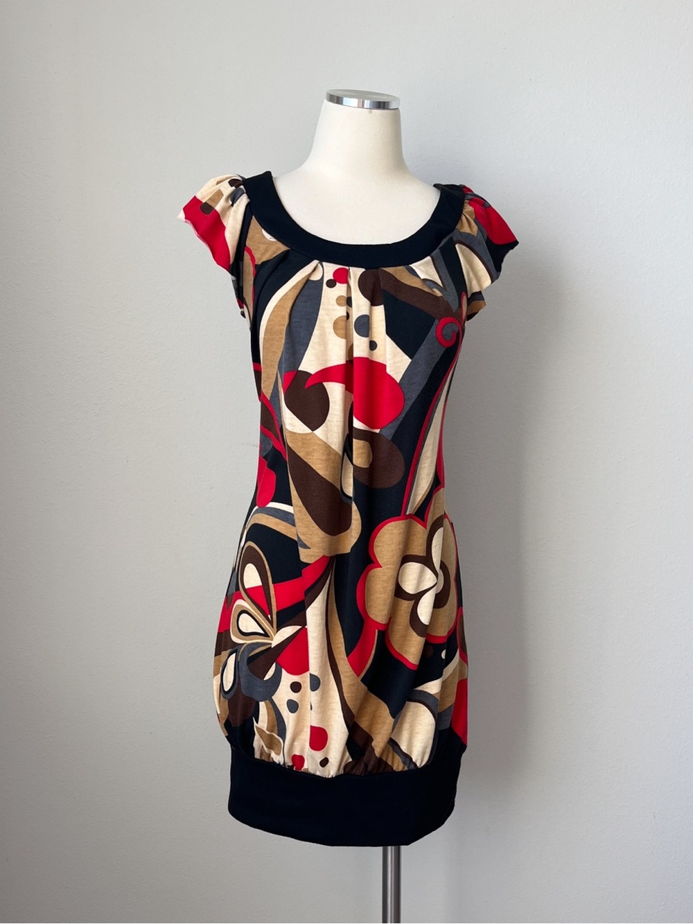 Y2K multicoloured abstract print mini dress with cap sleeves and pleated bodice.